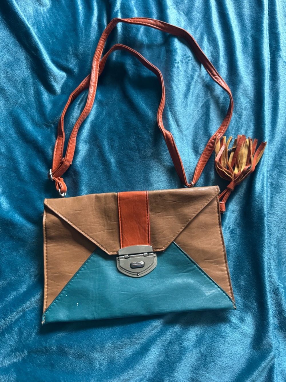 Two-Tone Teal and Brown Crossbody Bag with Orange Accent